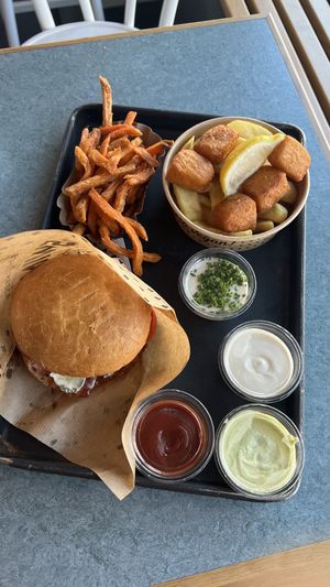 Bacon burger, fish and chips, and sweet potato fries    at Swing Kitchen - Schwedenplatz in Vienna