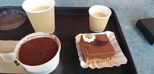 kaffee& Tiramisu & mandel-nougat at Swing Kitchen - Schwedenplatz in Vienna