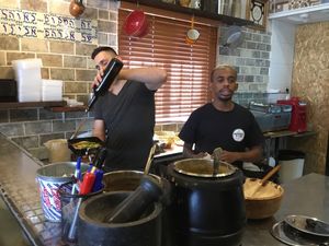 Staff speak English at Ozi Hummus Ful in Netanya
