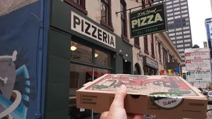 Hand Of Shroom pizza in hand! at 20th Street Pizza in Philadelphia
