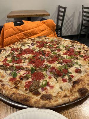 Ignore my imaginary friend. I tried and failed to smash this bad boy all by myself    at 20th Street Pizza in Philadelphia