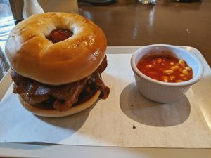 Paddy Bagel with vegan sausage, bacon, fried egg, hash brown and tomato at The Carrot's Tail in Rathmines