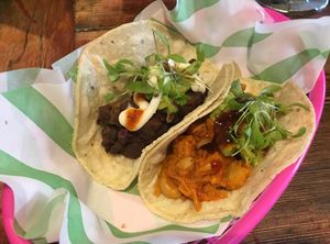 Jackfruit pibil and black bean plantain tacos at A Tribe Called Veg in Brighton