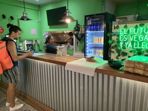 Counter is facing a seating area  at Guacamole in Montevideo