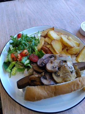 Hot dog with chips and garlic mushrooms (February 2024) at Dragonfly Bistro in Aberystwyth