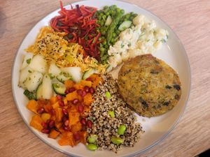 Platter: 'Fish' Cake Served With A Selection Of Salads at Dragonfly Bistro in Aberystwyth