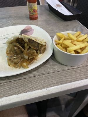 The mushroom Arequipa (sin queso) + papas fritas   at Quero Arepa in Cartagena