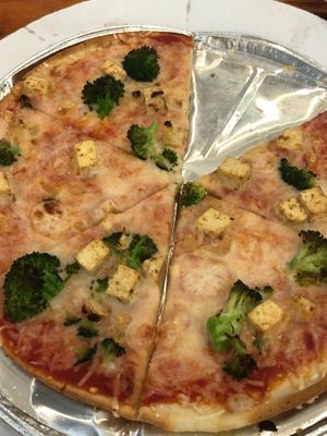 Pizza with broccoli and tofu  at Miguels Pizza in Slade