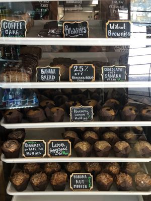 Vegan baked goods labeled with a green “v” (listed in my review) at Daniel Boone Coffee Shop in Slade
