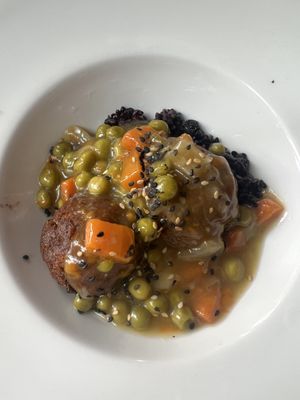 Tofu and mushroom balls with black rice   at Arc Iris in Barcelona