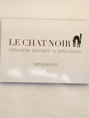 Sign at Le Chat Noir in Cefalu