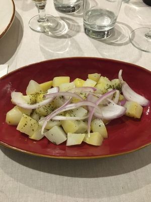 Insalata di patate, cipolla, olio, origano (Potato, onion, oil, origan salad) at Le Chat Noir in Cefalu