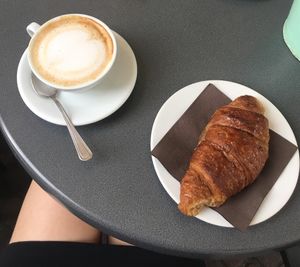 Vegan lemon and ginger croissant and rice milk cappuccino at The Coffee Box in Padua