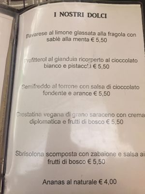 dessert menu: buckwheat vegan pie with cream and berries at Osteria Del Melograno in Cremona