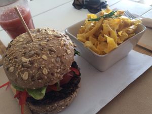 Black beans burger w/ avocado and sweet potato chips at Barraca Café in Lourinha