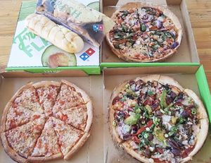 ‘Vegan Margherita’, ‘Vegan Avocado Veg’, ‘Vegan Spicy Trio’, ‘Vegan Cheesy Garlic Bread’.  at Domino's Pizza in Berwick