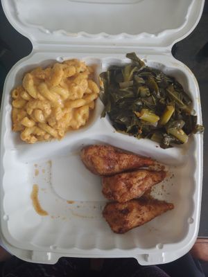 Vegan blackened drumsticks with vegan mac n cheese and collard greens at Vegan Hut Cafe in Waldorf