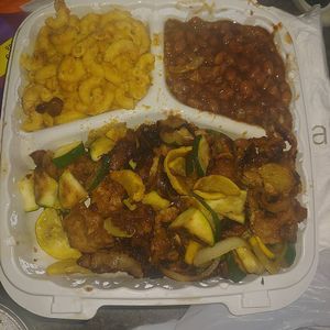 Vegan ginger chickn stir fry with vegan mac n cheese and baked beans at Vegan Hut Cafe in Waldorf