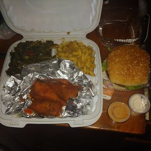 Vegan buffalo drumsticks, impossible burger, collard greens, and vegan mac n cheese at Vegan Hut Cafe in Waldorf