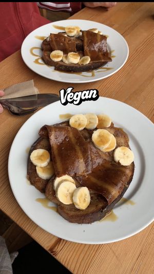 Vegan French toast & bacon w banana & maple syrup  at Chapter One Coffee Shop in Edinburgh