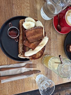 French toast with bacon, banana and maple syrup. 2 huge slices of sourdough bread which were cooked to perfection. This will definitely fill you up for the day. Also had the passio at Chapter One Coffee Shop in Edinburgh