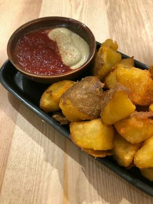 Bravas with brava kimchi and veganesse sauce at Odacova in Barcelona