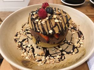 Pancakes with vegan nutella, banana and strawberries at Odacova in Barcelona