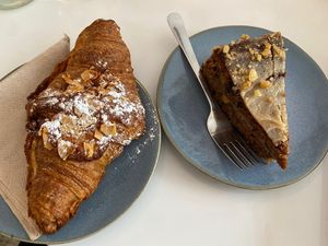Almond croissant and parsnip cake (very good) at Plenty in The Hague