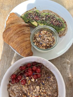 Avocado toast, croissant and yoghurt with granola. Chia bowl  at Plenty in The Hague