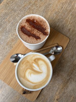 Cappuccino and a pumpkin spice choco latte  at Plenty in The Hague