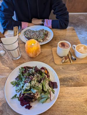 Sandwich avocado (top), Sandwich aubergine (bottom), Chico latte, Cappuccino at Plenty in The Hague