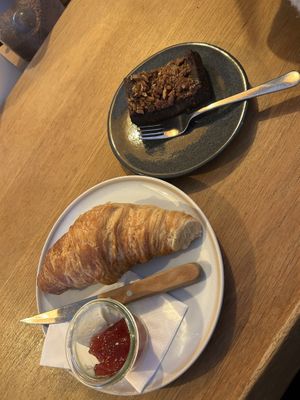 Sweet Potato Brownie 4,80€, Croissant 3,80€ Jam 1€ Butter 1€  at Plenty in The Hague