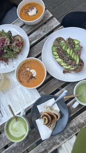 Soups and avocado toasts, cinnamon roll  at Plenty in The Hague
