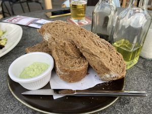 Bread served with the starter. We got an edamame-lime spread instead of the butter. You can also choose to eat it with the balsamic vinegar or olive oil you also get. at Brasserie BLVD in Vlissingen