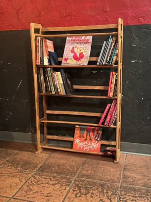 Bookshelf in dining area  at Mark of the Beastro in Salt Lake City