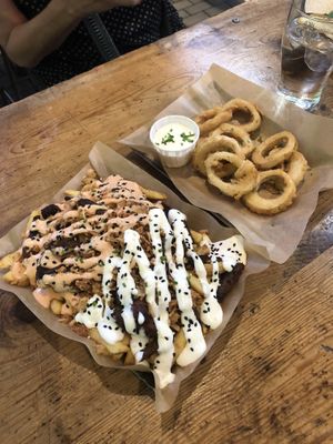 Delicious highlights from the Madrid Vegan Walking Tour: ‘calimari’ rings and patatas sin carne.  at Madrid Vegan Tours in Madrid