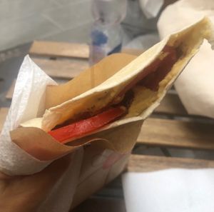 Piadina cecilia: hummus, caramelized onions and tomatoes   at La Foca Pia in Pisa