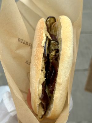 Sandwich with chickpea sauce, aubergine and caramelized onions  at La Foca Pia in Pisa