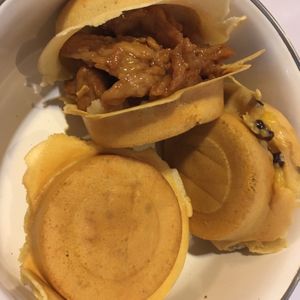 Three cup chicken, corn and bacon, and custard tapioca wheel cakes at Wheels of Fortune - Food Stall in Kaohsiung