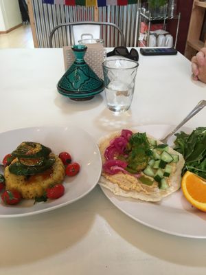 Polenta with zucchini and warm tomatoes and a falafel wrap.  at Terra Veg in Klamath Falls
