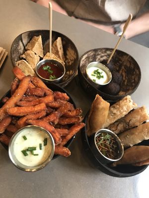 Finger food sharer and sweet potato fries - all delicious!  at La Cantine Viêtgétarienne in Bordeaux