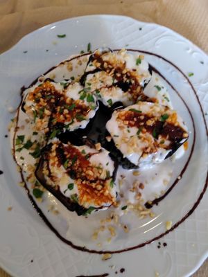 Really tasty aubergine with tahini and soy sauce with hazelnuts. at Baobab in Bilbao