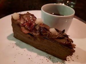 Mushroom crepe cake with mushroom "tea" (aka mushroom broth) at Dirt Candy in New York City