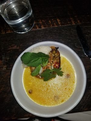 FOURTH COURSE -

stuffed bell pepper, sticky rice, orange pepper-coconut sauce, lime, thai chilis at Dirt Candy in New York City
