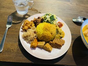 Taste tesing plate with a bunch of different sauces; tofu, tempeh etc. Awesome. I asked for extra salad and got it  at Sayur in Gothenburg