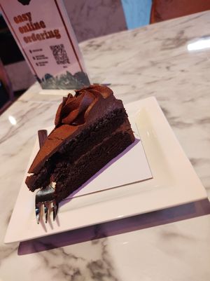 Chocolate cake. Tasty, lot of cream. Expensive. at Vegan Heroes in Eindhoven