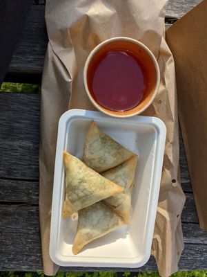 Samosas served with sweet chilli dip at Vegan Heroes in Eindhoven