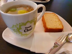 Fresh ginger tea and lemon cake at Kaffee Piraten in Dusseldorf
