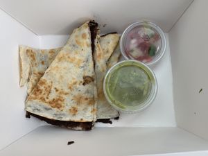 Black bean quesadilla with vegan sour cream, guacamole and pico de Gallo  at High Note Cafe in Boise