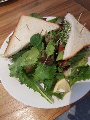 Vegan avocado sandwich. Slightly toasted bread with avocado, tomato and an assortment of salad and herbs.  at SLOW Plant Based Cafe in Koshigaya